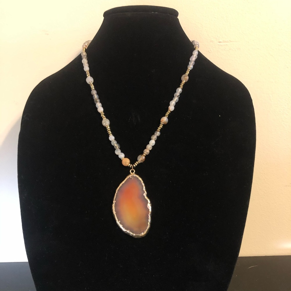 Carnelian slice agate pendant with carnelian bead necklace.